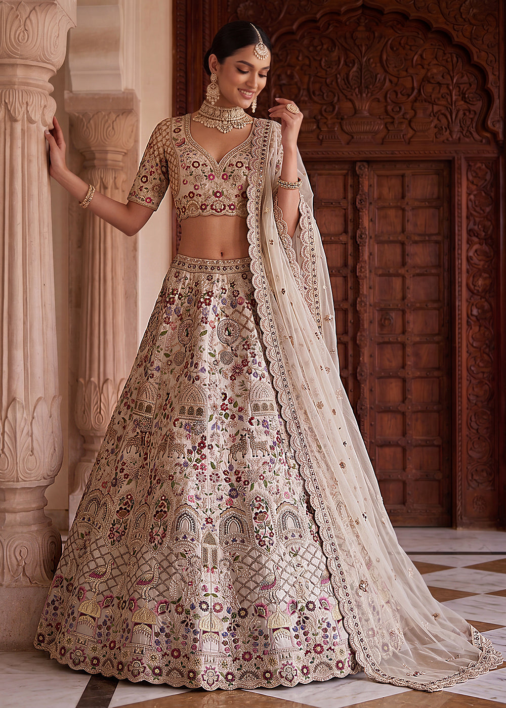 Buy Now Off White Heavy Embroidered Wedding Function Lehenga Choli Online in US, UK, Canada, France, Italy, Germany, Sweden, UAE & Worldwide at Empress Clothing.