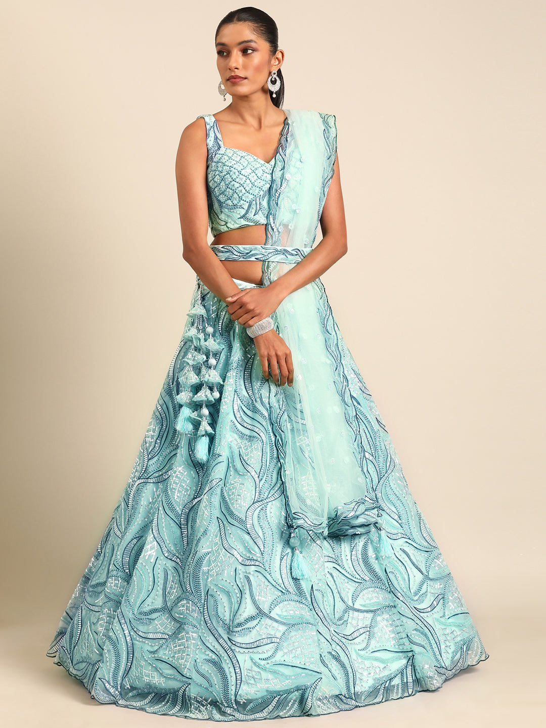 Buy Now Turquoise Sequins & Zarkan Embroidered Reception Lehenga Choli Online in USA, UK, Canada & Worldwide at Empress Clothing. 