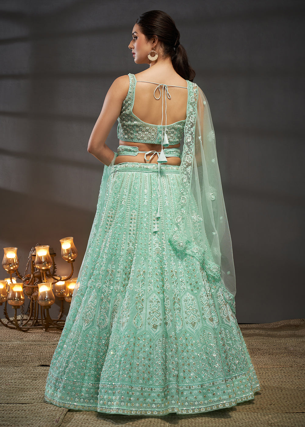 Buy Now Embroidered Heavy Net Turquoise Designer Lehenga Choli Online in USA, UK, Canada & Worldwide at Empress Clothing. 