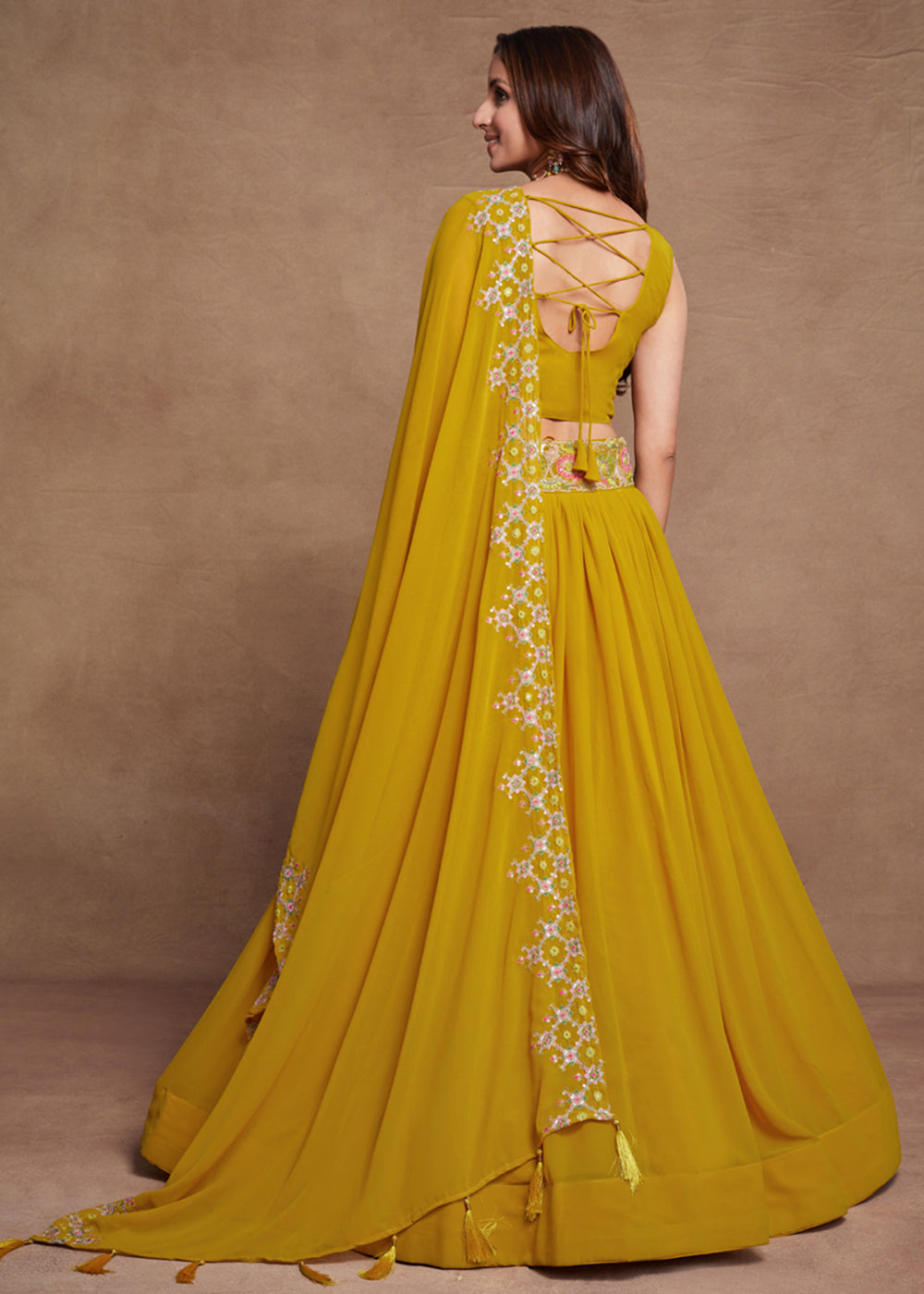 Buy Now Blooming Georgette Yellow Embroidered Festive Lehenga Choli Online in USA, UK, Canada & Worldwide at Empress Clothing.