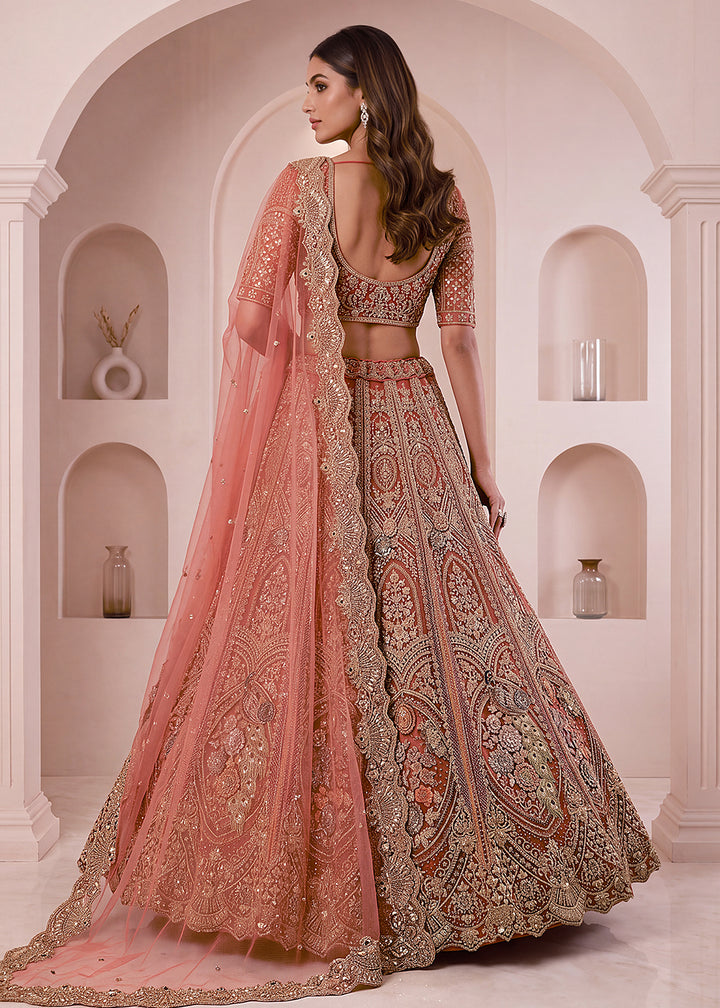 Buy Now Peach Premium Heavy Embroidered Bridal Lehanga Choli Online in US, UK, Canada, France, Italy, Germany, Sweden, Austria, UAE &amp; Worldwide at Empress.