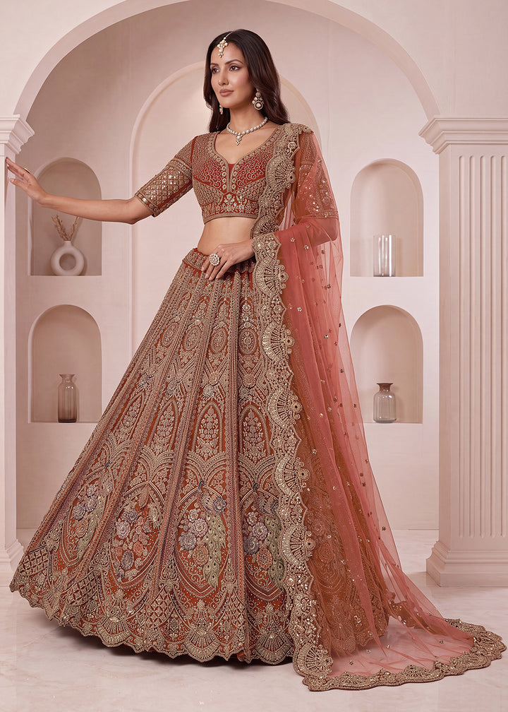 Buy Now Peach Premium Heavy Embroidered Bridal Lehanga Choli Online in US, UK, Canada, France, Italy, Germany, Sweden, Austria, UAE &amp; Worldwide at Empress.