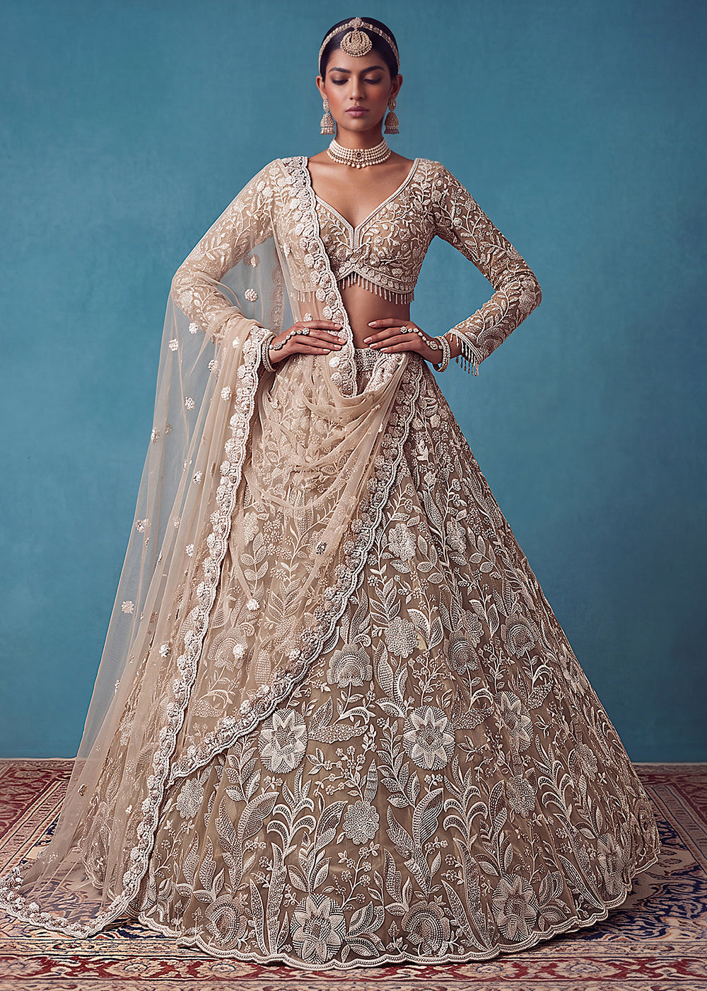 Buy Now Extraordinary Golden Flared Hand-Embroidered Lehenga Choli Online in US, UK, Canada, France, Italy, Germany, Sweden, Denmark & Worldwide at Empress.