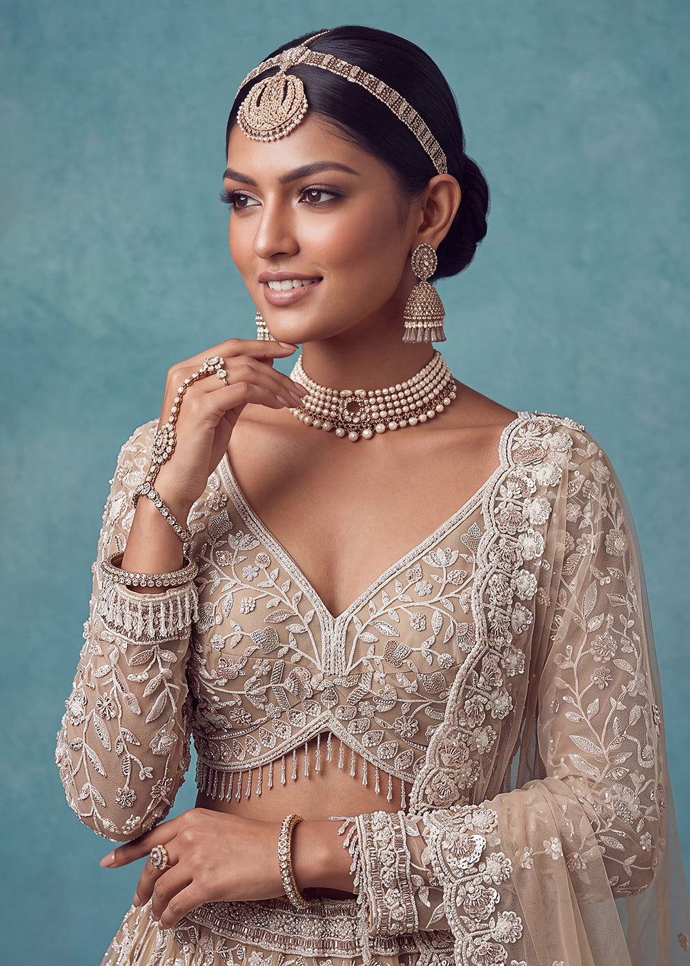 Buy Now Extraordinary Golden Flared Hand-Embroidered Lehenga Choli Online in US, UK, Canada, France, Italy, Germany, Sweden, Denmark & Worldwide at Empress.