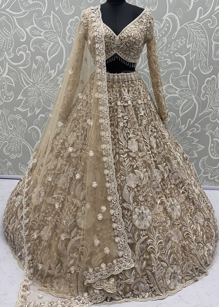 Buy Now Extraordinary Golden Flared Hand-Embroidered Lehenga Choli Online in US, UK, Canada, France, Italy, Germany, Sweden, Denmark &amp; Worldwide at Empress.