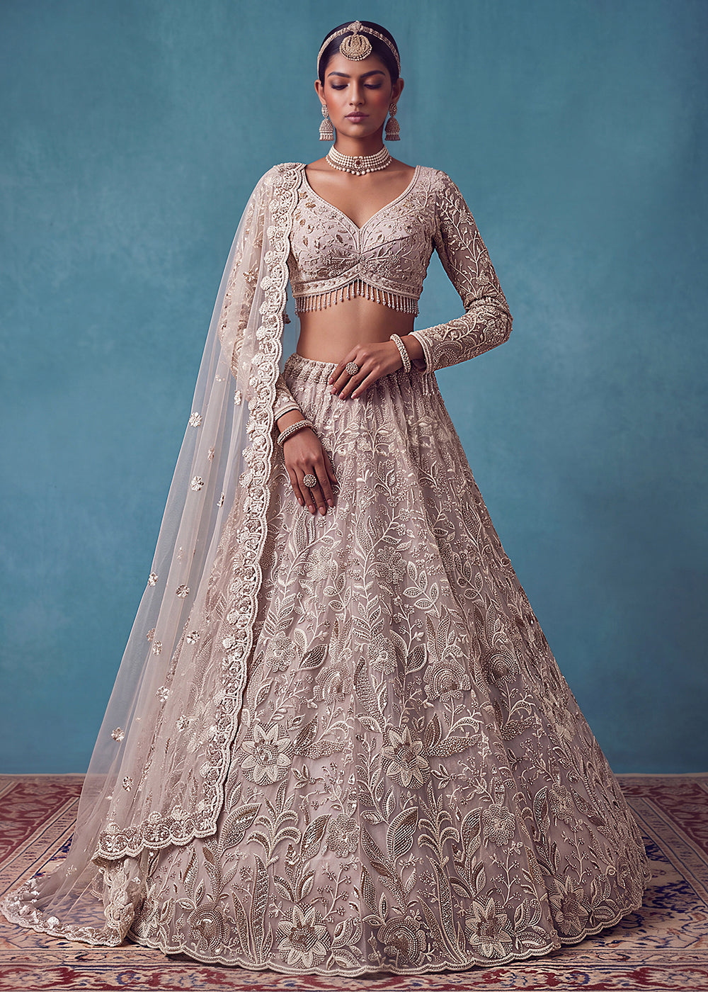 Buy Now Extraordinary Mauve Flared Hand-Embroidered Lehenga Choli Online in US, UK, Canada, France, Italy, Germany, Sweden, Denmark, UAE & Worldwide at Empress.