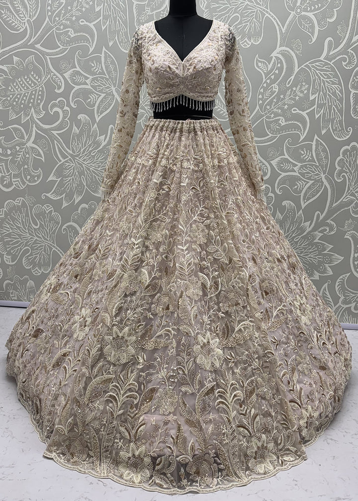 Buy Now Extraordinary Mauve Flared Hand-Embroidered Lehenga Choli Online in US, UK, Canada, France, Italy, Germany, Sweden, Denmark, UAE &amp; Worldwide at Empress.
