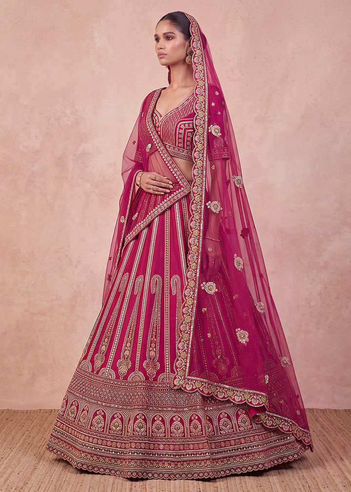 Buy Now Eye-Catchy Handwork Motif &amp; Sequins Pink Bridal Lehenga Choli Online in US, UK, Canada, France, Italy, Germany, Sweden, Austria &amp; Worldwide at Empress.
