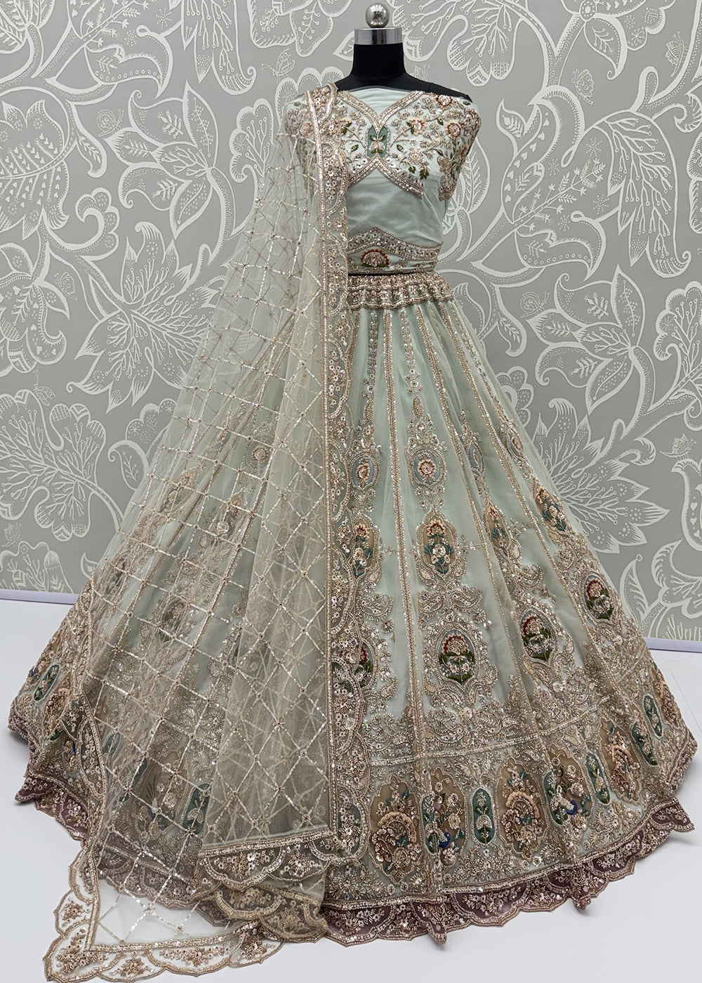 Buy Now Appealing Blue Net Heavy Embroidered Bridal Lehenga Choli Online in US, UK, Canada, France, Italy, Germany, Sweden, Austria, UAE &amp; Worldwide at Empress.