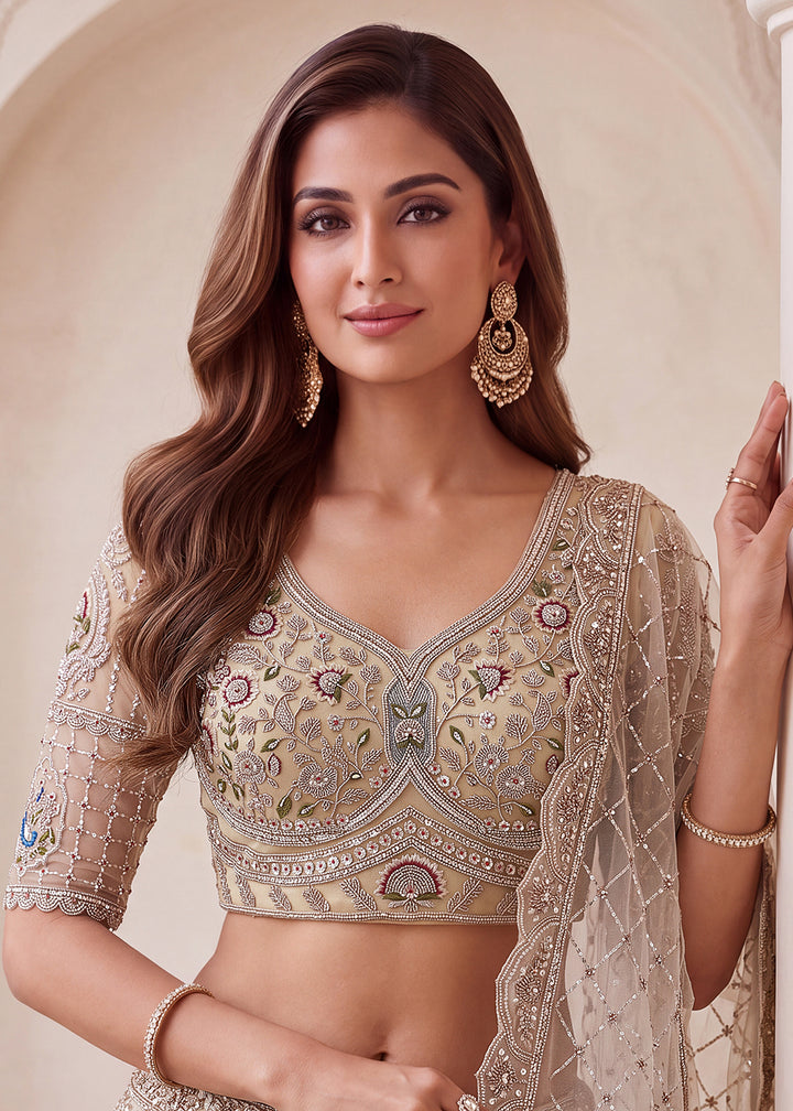 Buy Now Appealing Green Net Heavy Embroidered Bridal Lehenga Choli Online in US, UK, Canada, France, Italy, Germany, Sweden, Austria, UAE &amp; Worldwide at Empress.