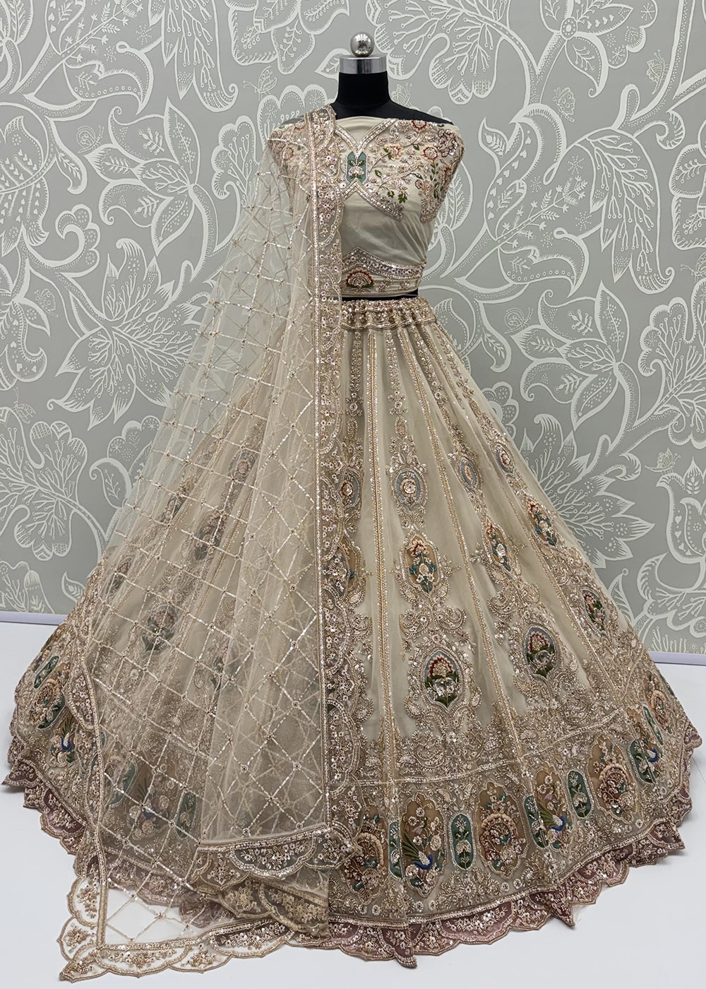 Buy Now Appealing Green Net Heavy Embroidered Bridal Lehenga Choli Online in US, UK, Canada, France, Italy, Germany, Sweden, Austria, UAE &amp; Worldwide at Empress.