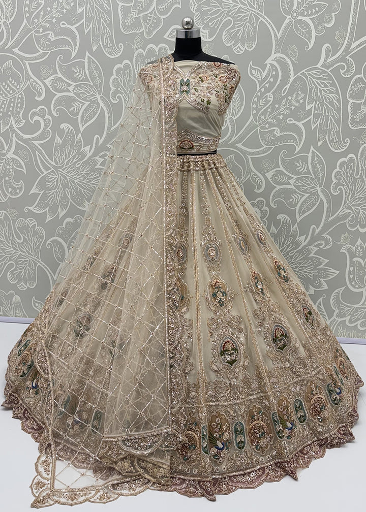 Buy Now Appealing Green Net Heavy Embroidered Bridal Lehenga Choli Online in US, UK, Canada, France, Italy, Germany, Sweden, Austria, UAE &amp; Worldwide at Empress.