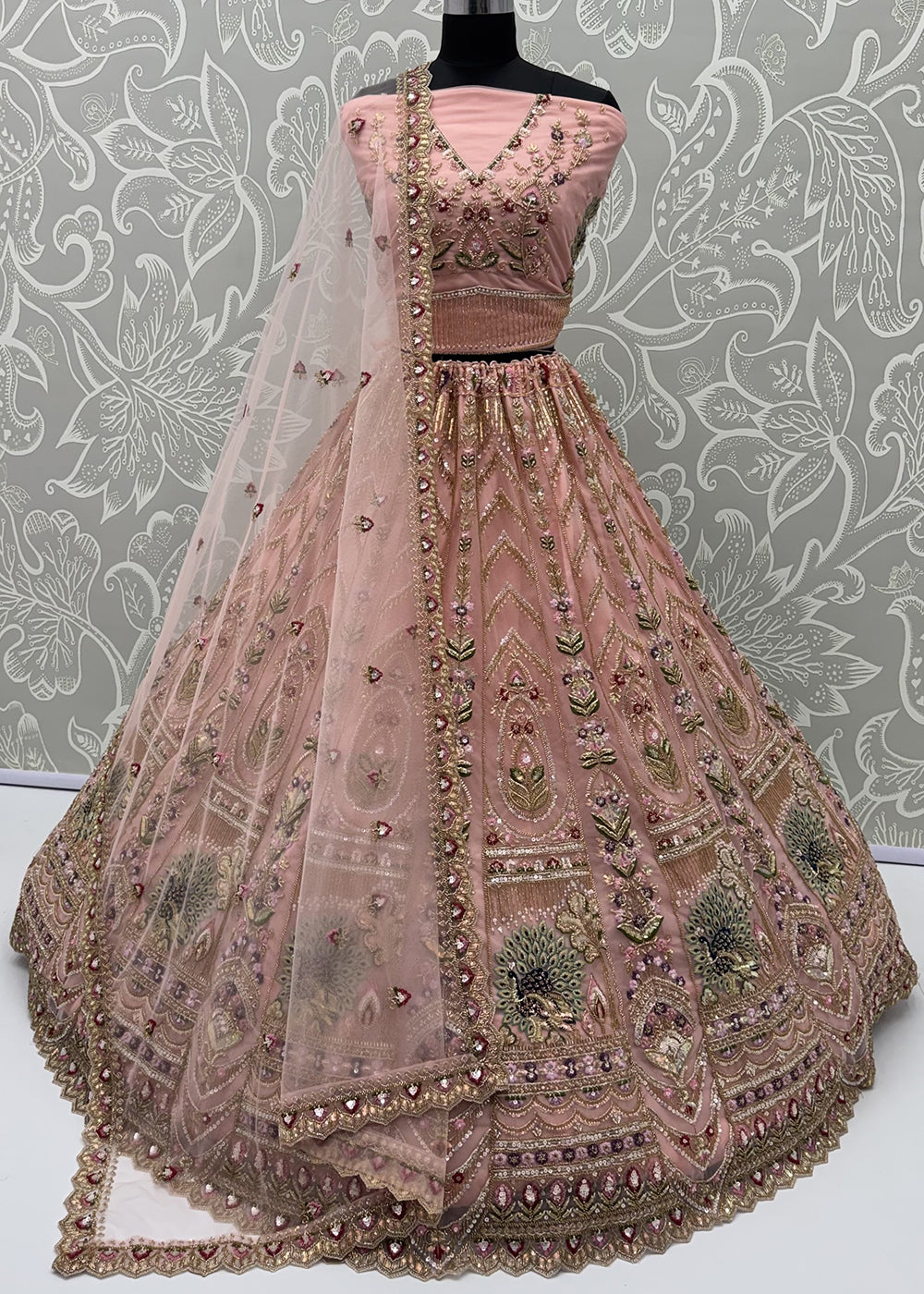 Buy Now Peacock Pattern Motif Peach Designer Wedding Lehenga Choli Online in US, UK, Canada, France, Italy, Germany, Sweden, Denmark, UAE &amp; Worldwide at Empress.