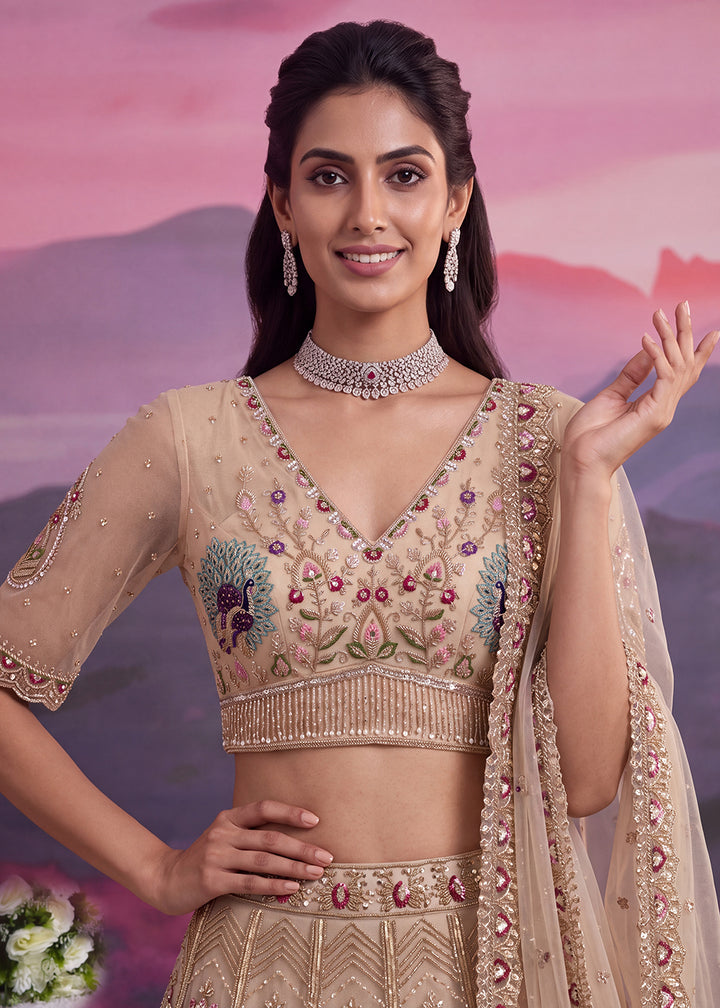 Buy Now Peacock Pattern Motif Beige Designer Wedding Lehenga Choli Online in US, UK, Canada, France, Italy, Germany, Sweden, Denmark, UAE &amp; Worldwide at Empress