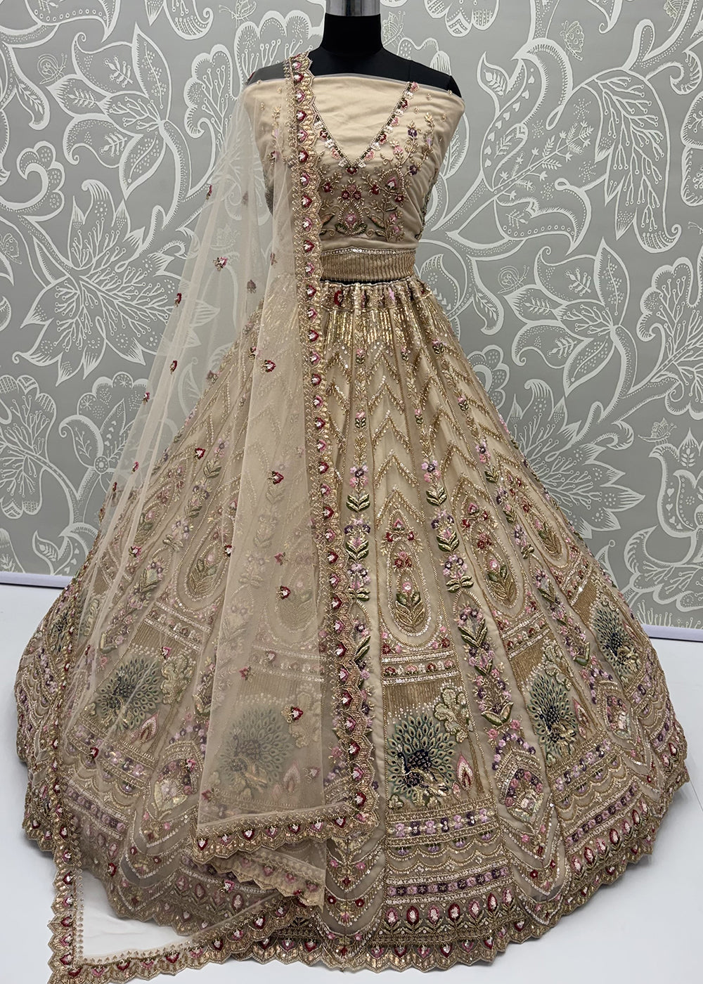 Buy Now Peacock Pattern Motif Beige Designer Wedding Lehenga Choli Online in US, UK, Canada, France, Italy, Germany, Sweden, Denmark, UAE &amp; Worldwide at Empress
