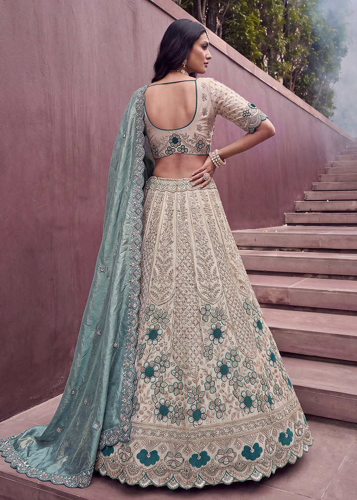 Buy Now Teal Blue Flower Pattern Motif &amp; Beads Attractive Lehenga Choli Online in US, UK, Canada, France, Italy, Germany, Sweden, UAE &amp; Worldwide at Empress.