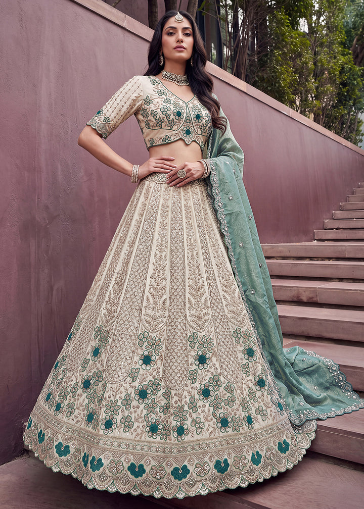 Buy Now Teal Blue Flower Pattern Motif &amp; Beads Attractive Lehenga Choli Online in US, UK, Canada, France, Italy, Germany, Sweden, UAE &amp; Worldwide at Empress.