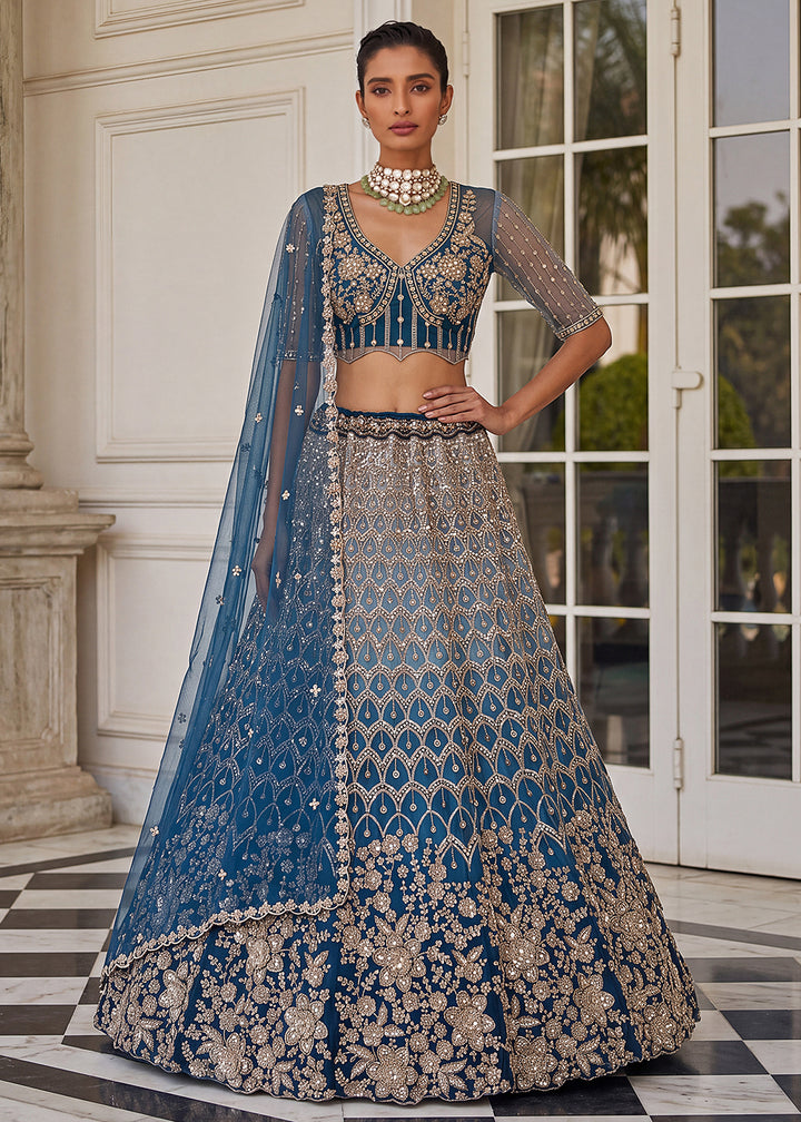 Buy Now Shaded Blue Premium Net Embroidered Lehenga Choli Online in US, UK, Canada, France, Italy, Germany, Sweden, Denmark, Australia &amp; Worldwide at Empress.