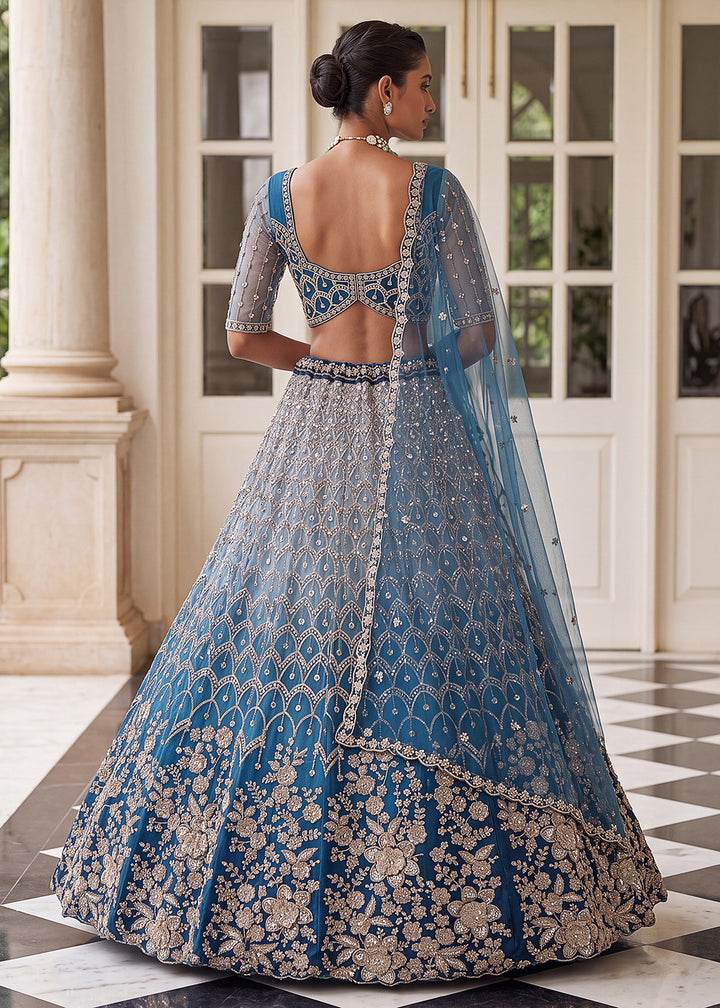 Buy Now Shaded Blue Premium Net Embroidered Lehenga Choli Online in US, UK, Canada, France, Italy, Germany, Sweden, Denmark, Australia &amp; Worldwide at Empress.