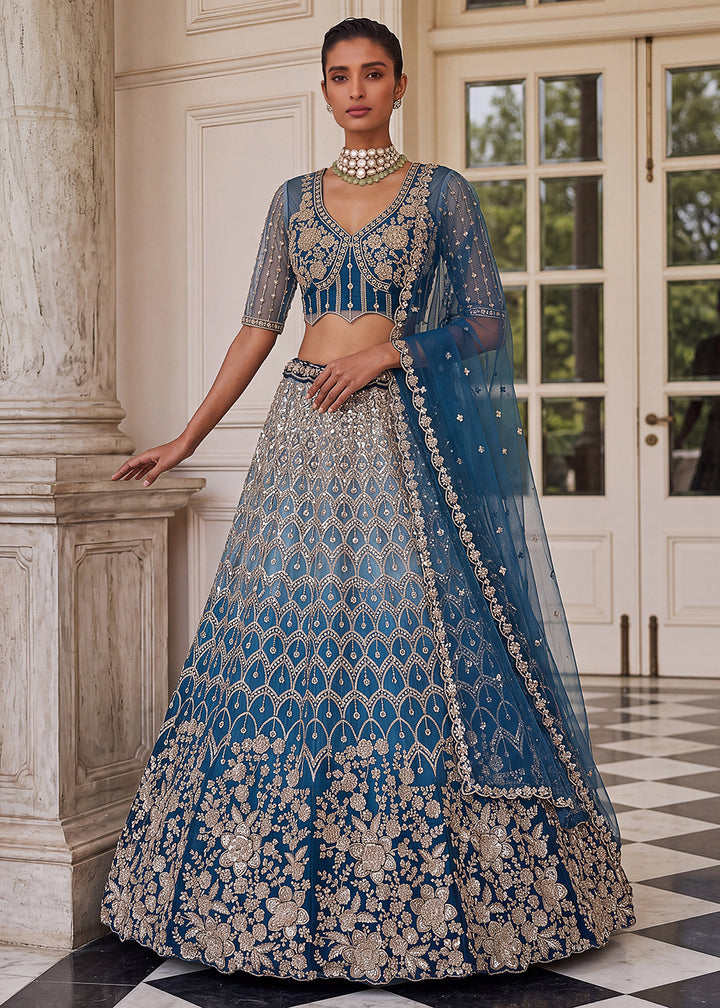 Buy Now Shaded Blue Premium Net Embroidered Lehenga Choli Online in US, UK, Canada, France, Italy, Germany, Sweden, Denmark, Australia &amp; Worldwide at Empress.