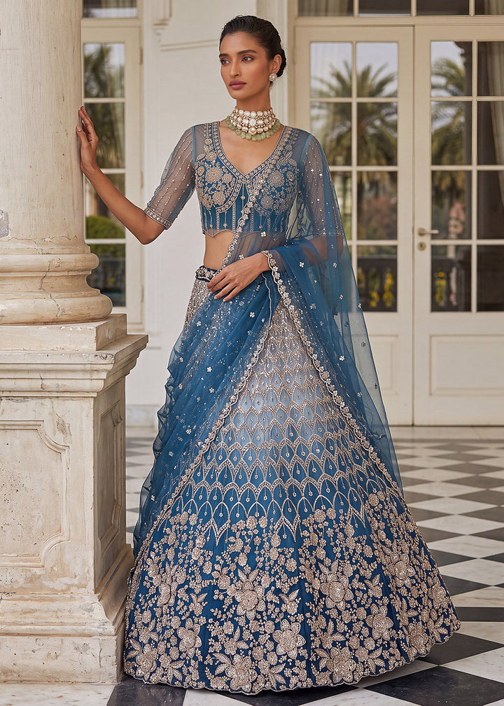 Buy Now Shaded Blue Premium Net Embroidered Lehenga Choli Online in US, UK, Canada, France, Italy, Germany, Sweden, Denmark, Australia &amp; Worldwide at Empress.
