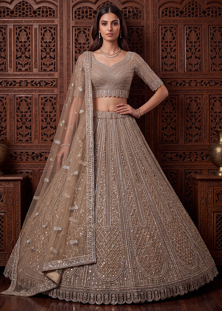 Buy Now Gold Tremendous Embroidery Designer Reception Lehenga Choli Online in US, UK, Canada, France, Italy, Germany, Sweden, Australia &amp; Worldwide at Empress.