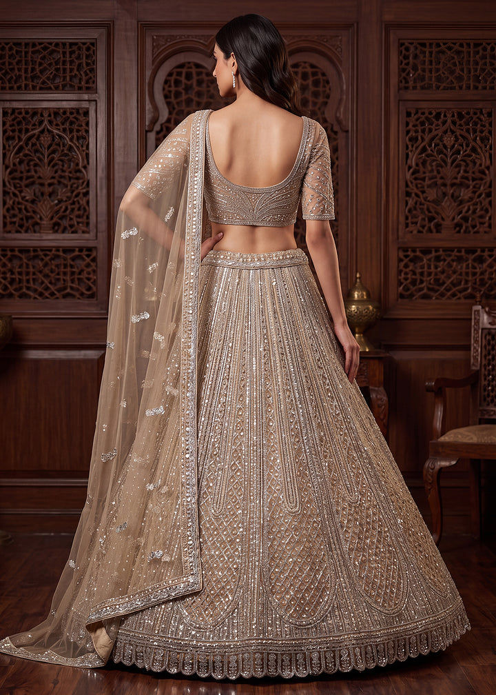 Buy Now Gold Tremendous Embroidery Designer Reception Lehenga Choli Online in US, UK, Canada, France, Italy, Germany, Sweden, Australia &amp; Worldwide at Empress.