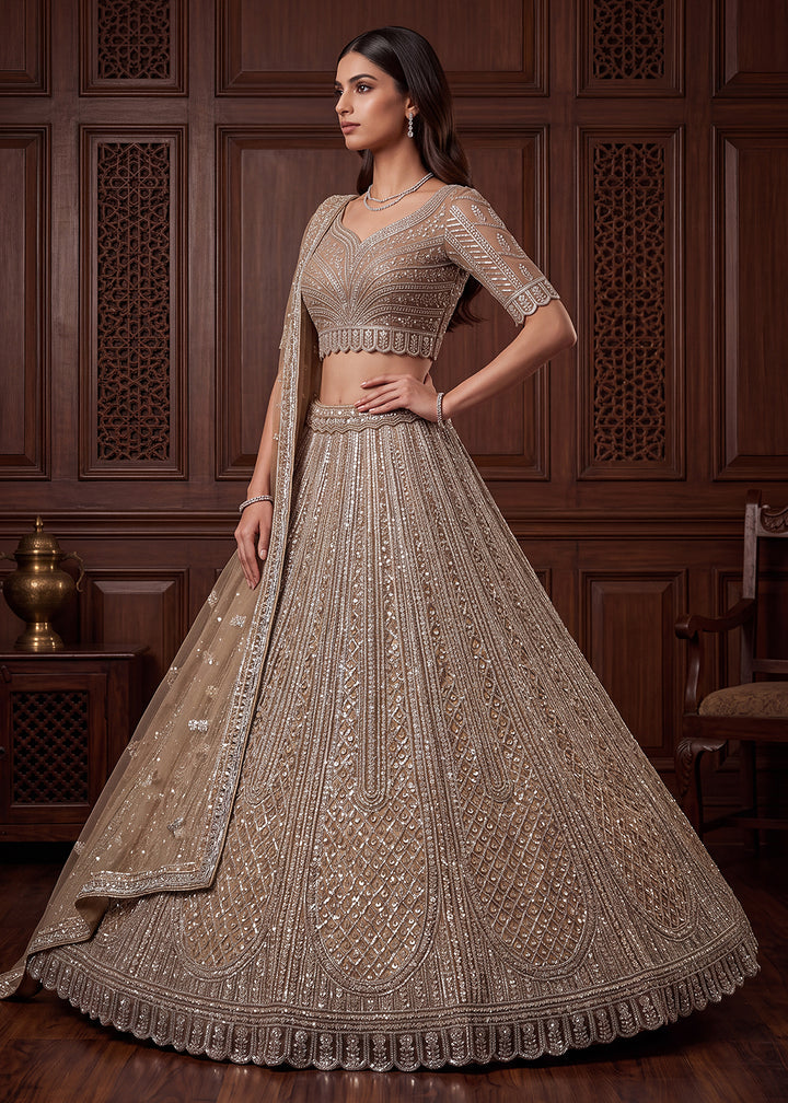 Buy Now Gold Tremendous Embroidery Designer Reception Lehenga Choli Online in US, UK, Canada, France, Italy, Germany, Sweden, Australia &amp; Worldwide at Empress.