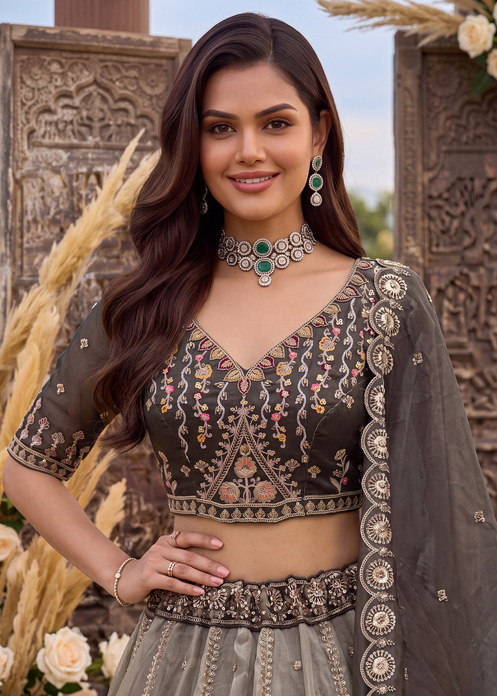 Buy Now Astonishing Art Of Work in Shaded Grey Designer Lehenga Choli Online in US, UK, Canada, France, Italy, Germany, Sweden, Denmark &amp; Worldwide at Empress.