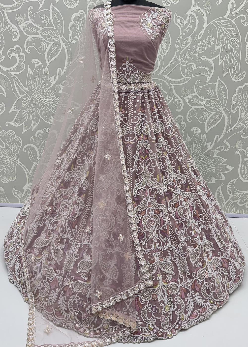 Shop Now Dreamy Lilac Sheer-Sleeve Party Wear Lehenga Choli Online in USA, UK, Canada, France, Germany, Spain, Austria, Sweden, UAE &amp; Worldwide at Empress.