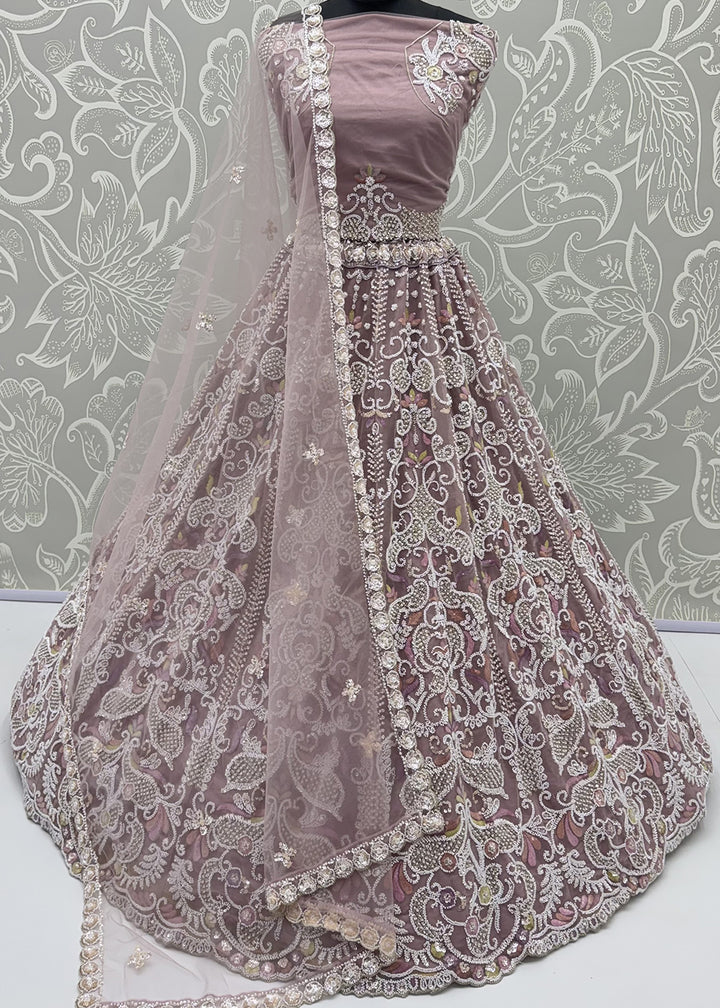 Shop Now Dreamy Lilac Sheer-Sleeve Party Wear Lehenga Choli Online in USA, UK, Canada, France, Germany, Spain, Austria, Sweden, UAE &amp; Worldwide at Empress.