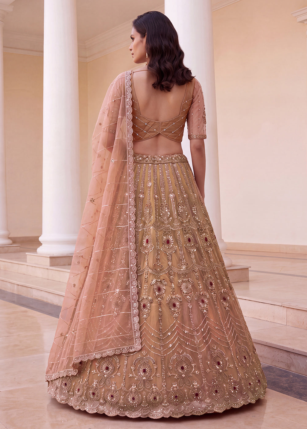 Shop Now Eye-catchy Peach Ruby Stone Work Wedding Lehenga Choli Online in USA, UK, Canada, France, Germany, Austria, Australia, Italy &amp; Worldwide at Empress.