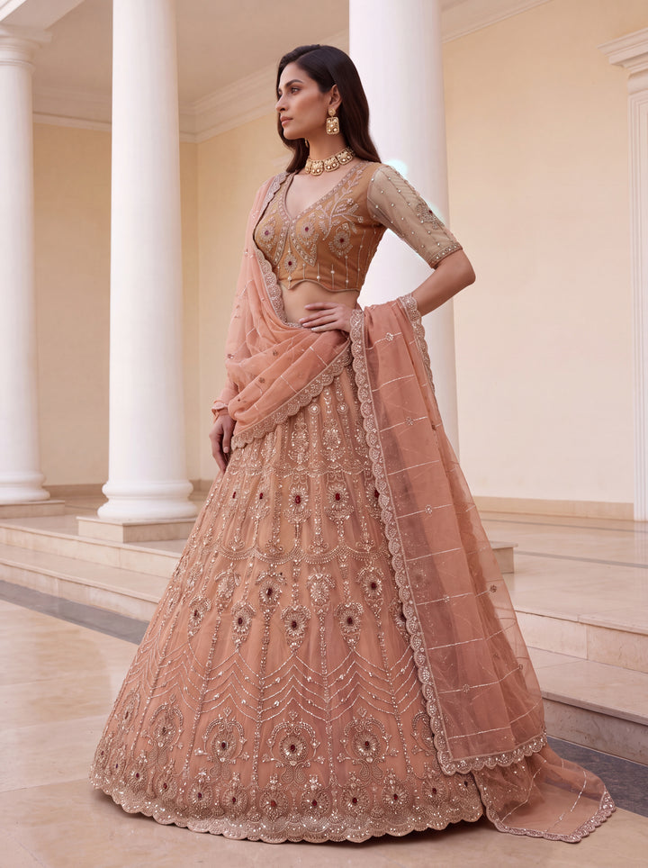 Shop Now Eye-catchy Peach Ruby Stone Work Wedding Lehenga Choli Online in USA, UK, Canada, France, Germany, Austria, Australia, Italy &amp; Worldwide at Empress.