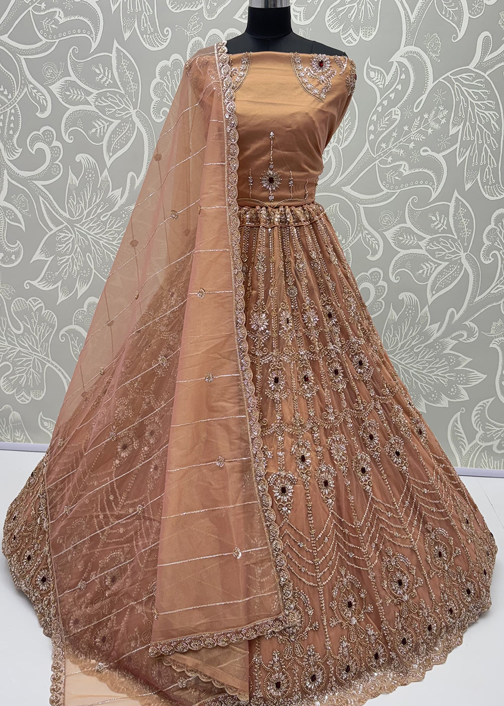 Shop Now Eye-catchy Peach Ruby Stone Work Wedding Lehenga Choli Online in USA, UK, Canada, France, Germany, Austria, Australia, Italy &amp; Worldwide at Empress.