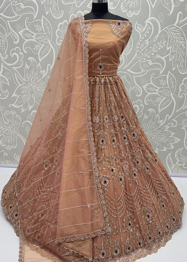 Shop Now Eye-catchy Peach Ruby Stone Work Wedding Lehenga Choli Online in USA, UK, Canada, France, Germany, Austria, Australia, Italy &amp; Worldwide at Empress.
