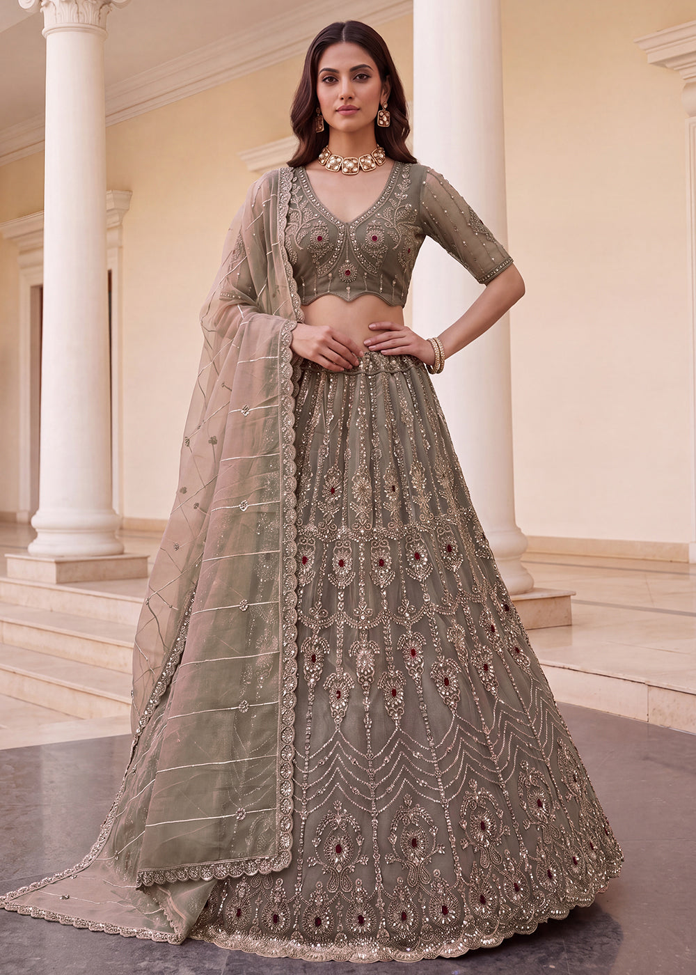 Shop Now Eye-catchy Beige Ruby Stone Work Wedding Lehenga Choli Online in USA, UK, Canada, France, Germany, Austria, Australia, Italy & Worldwide at Empress.