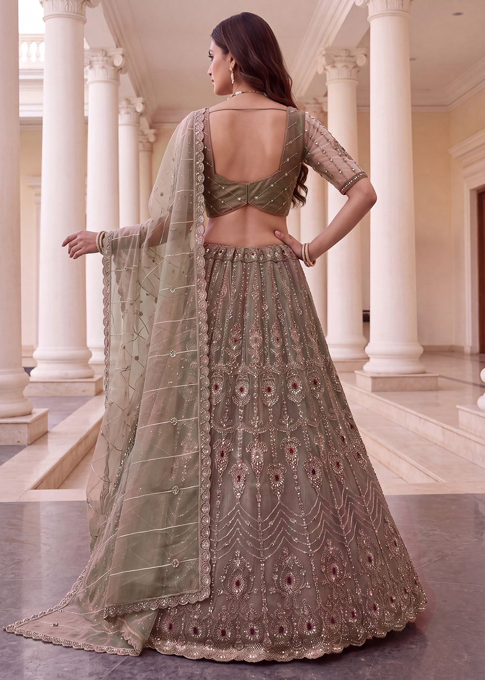 Shop Now Eye-catchy Beige Ruby Stone Work Wedding Lehenga Choli Online in USA, UK, Canada, France, Germany, Austria, Australia, Italy &amp; Worldwide at Empress.