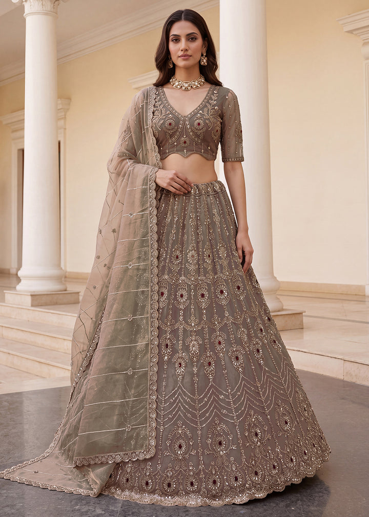 Shop Now Eye-catchy Beige Ruby Stone Work Wedding Lehenga Choli Online in USA, UK, Canada, France, Germany, Austria, Australia, Italy &amp; Worldwide at Empress.
