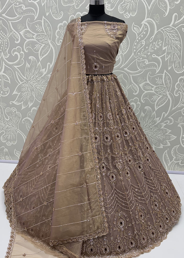 Shop Now Eye-catchy Beige Ruby Stone Work Wedding Lehenga Choli Online in USA, UK, Canada, France, Germany, Austria, Australia, Italy &amp; Worldwide at Empress.