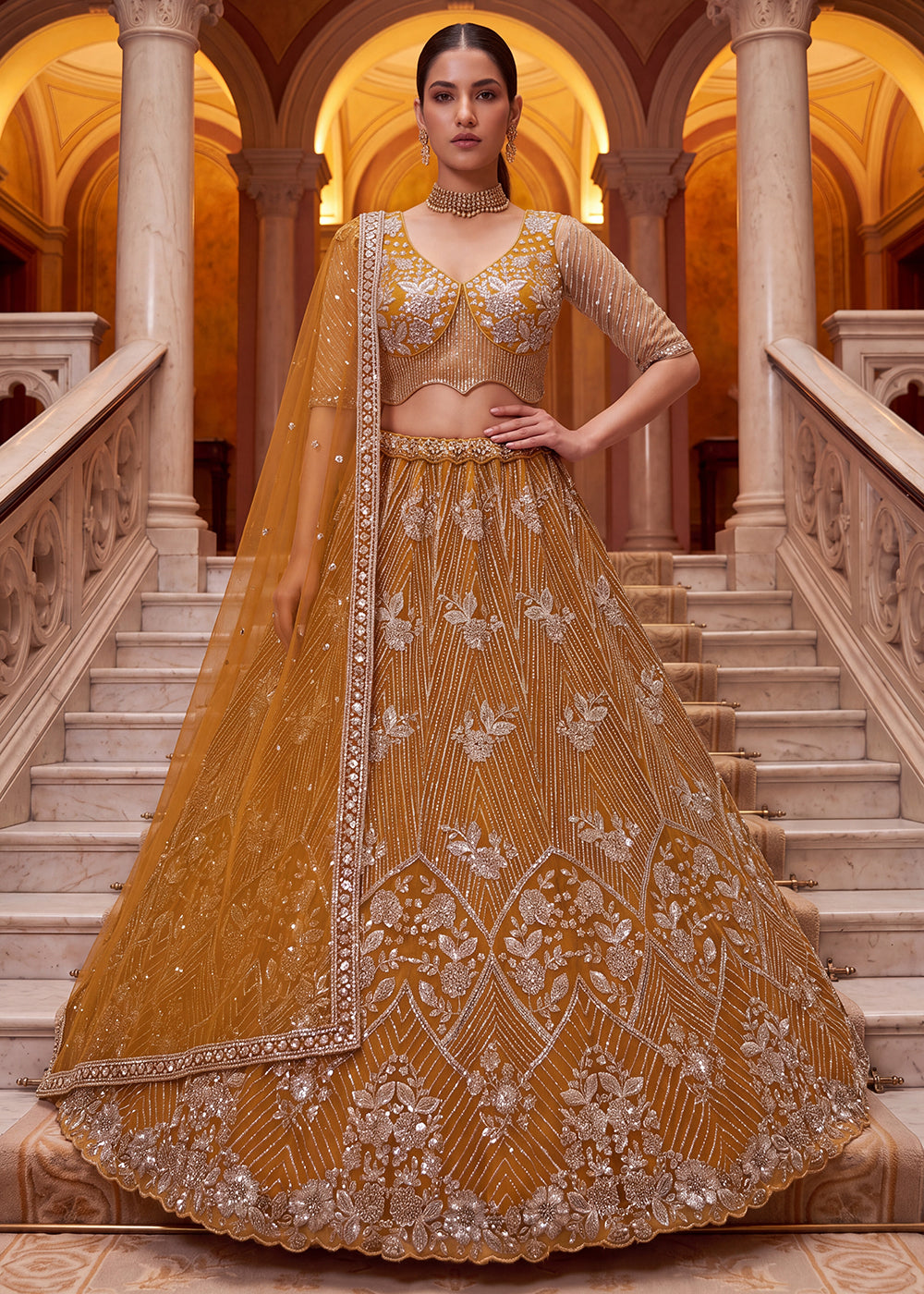 Shop Breathtaking Yellow Heavy Embroidery Reception Party Lehenga Choli Online in USA, UK, Canada, France, Germany, Spain, Austria, UAE & Worldwide at Empress.