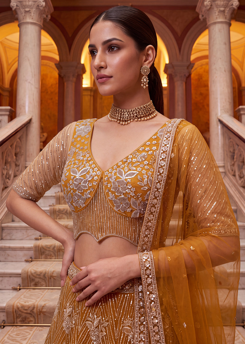 Shop Breathtaking Yellow Heavy Embroidery Reception Party Lehenga Choli Online in USA, UK, Canada, France, Germany, Spain, Austria, UAE &amp; Worldwide at Empress.