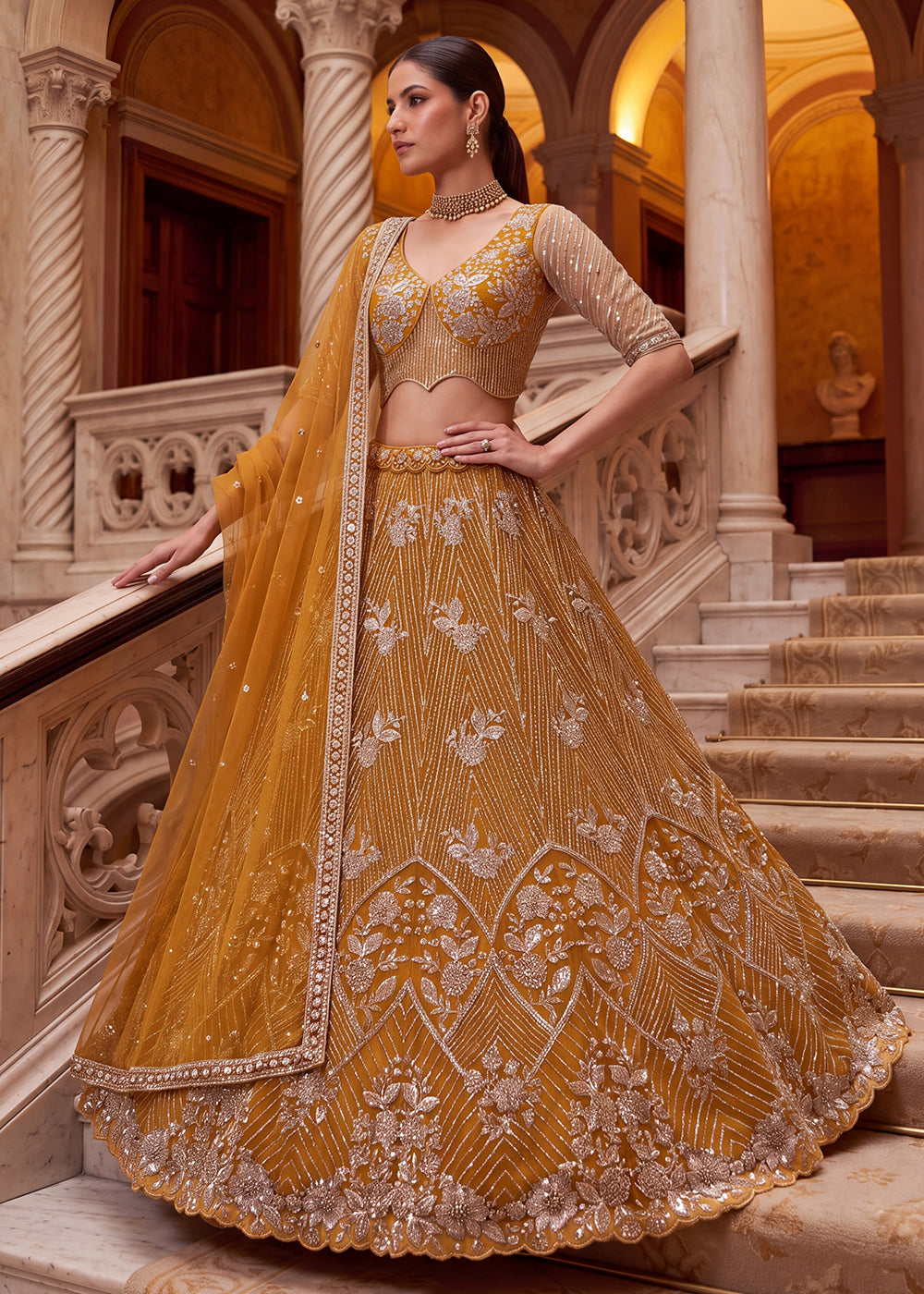 Shop Breathtaking Yellow Heavy Embroidery Reception Party Lehenga Choli Online in USA, UK, Canada, France, Germany, Spain, Austria, UAE &amp; Worldwide at Empress.