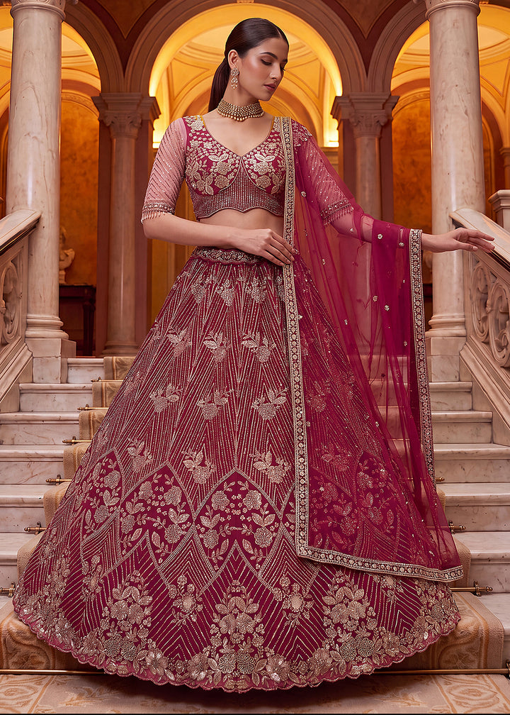 Shop Breathtaking Pink Heavy Embroidery Reception Party Lehenga Choli Online in USA, UK, Canada, France, Germany, Spain, Austria, UAE &amp; Worldwide at Empress.