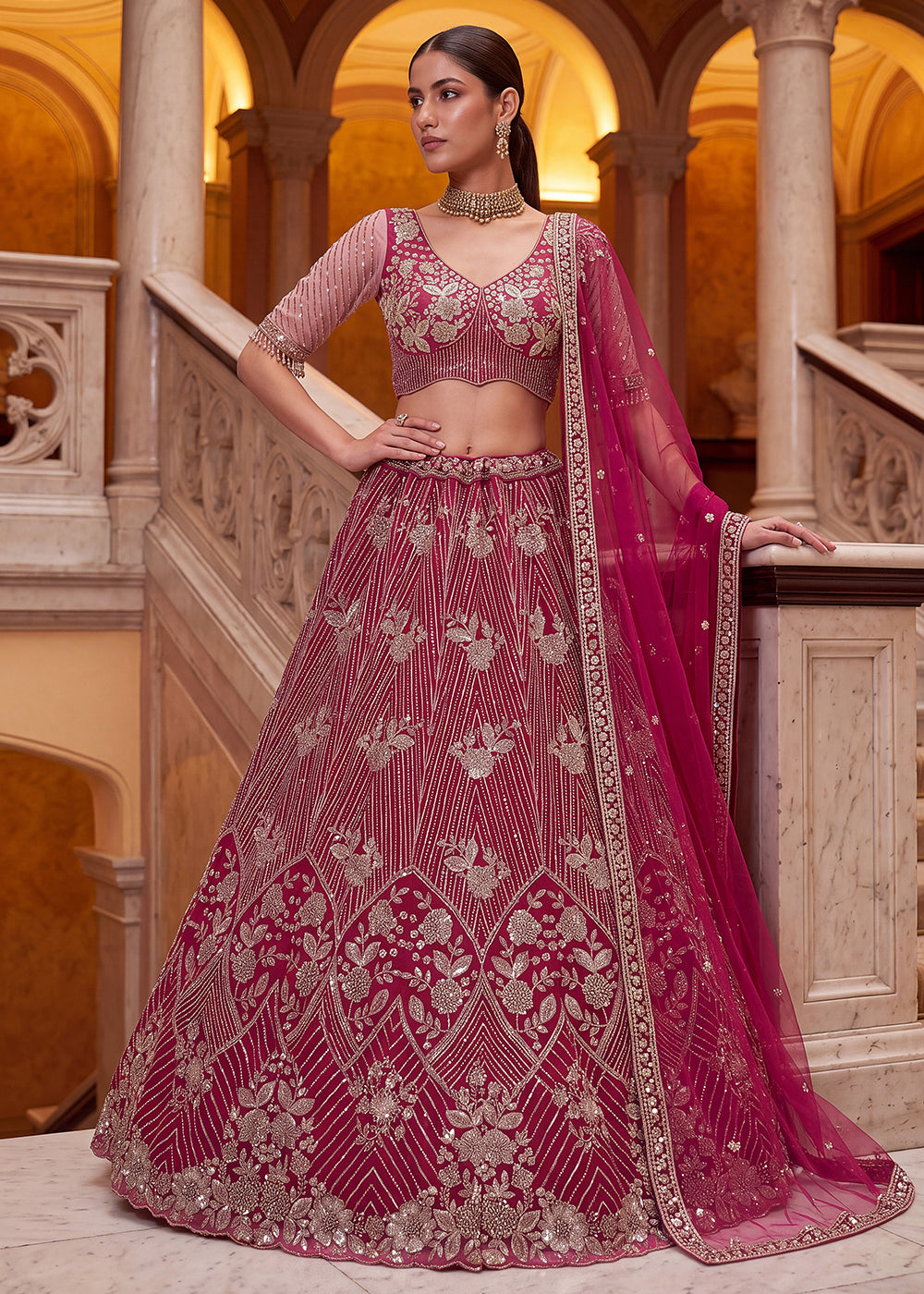 Shop Breathtaking Pink Heavy Embroidery Reception Party Lehenga Choli Online in USA, UK, Canada, France, Germany, Spain, Austria, UAE &amp; Worldwide at Empress.