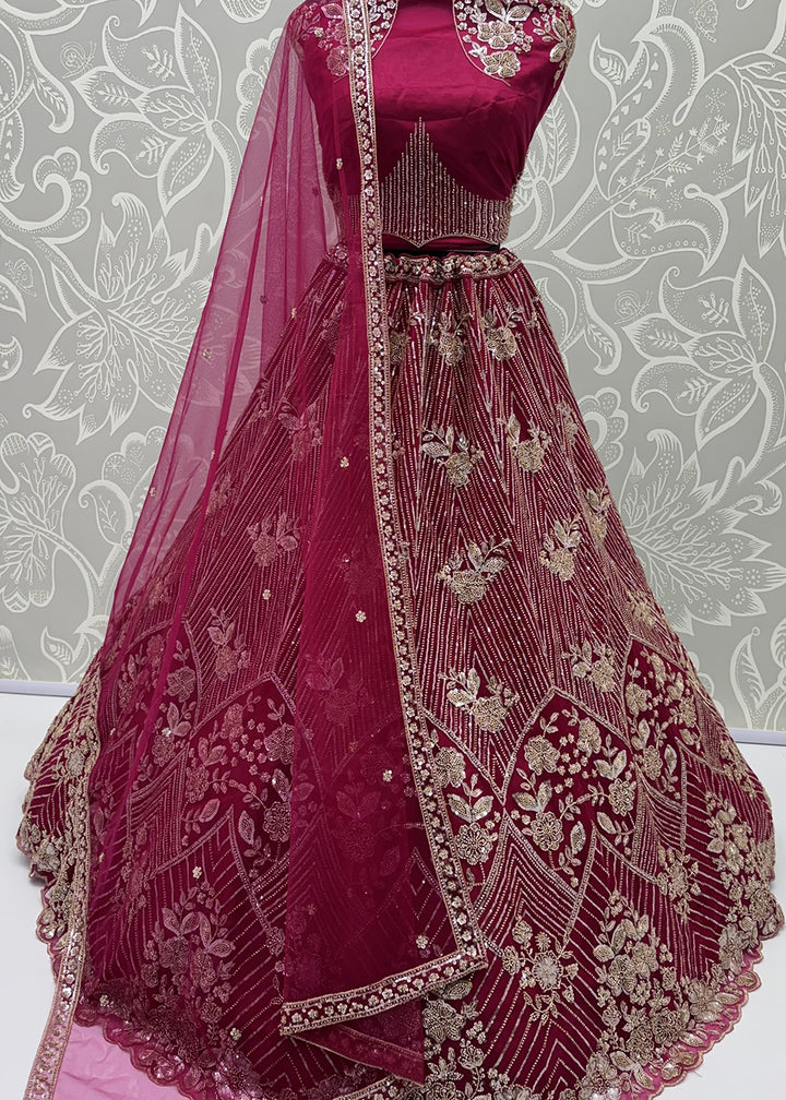 Shop Breathtaking Pink Heavy Embroidery Reception Party Lehenga Choli Online in USA, UK, Canada, France, Germany, Spain, Austria, UAE &amp; Worldwide at Empress.