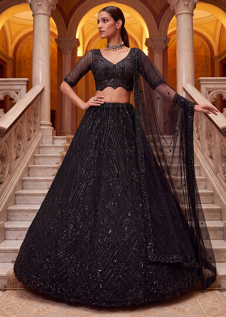 Shop Breathtaking Black Heavy Embroidery Reception Party Lehenga Choli Online in USA, UK, Canada, France, Germany, Spain, Austria, UAE &amp; Worldwide at Empress.