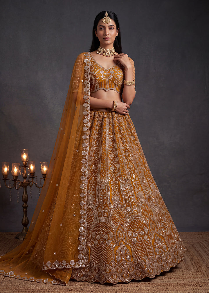 Shop Now Amazing Rust Designed Wedding Wear Lehenga Choli Online in USA, UK, Canada, France, Germany, Austria, Australia, Italy, Denmark &amp; Worldwide at Empress.