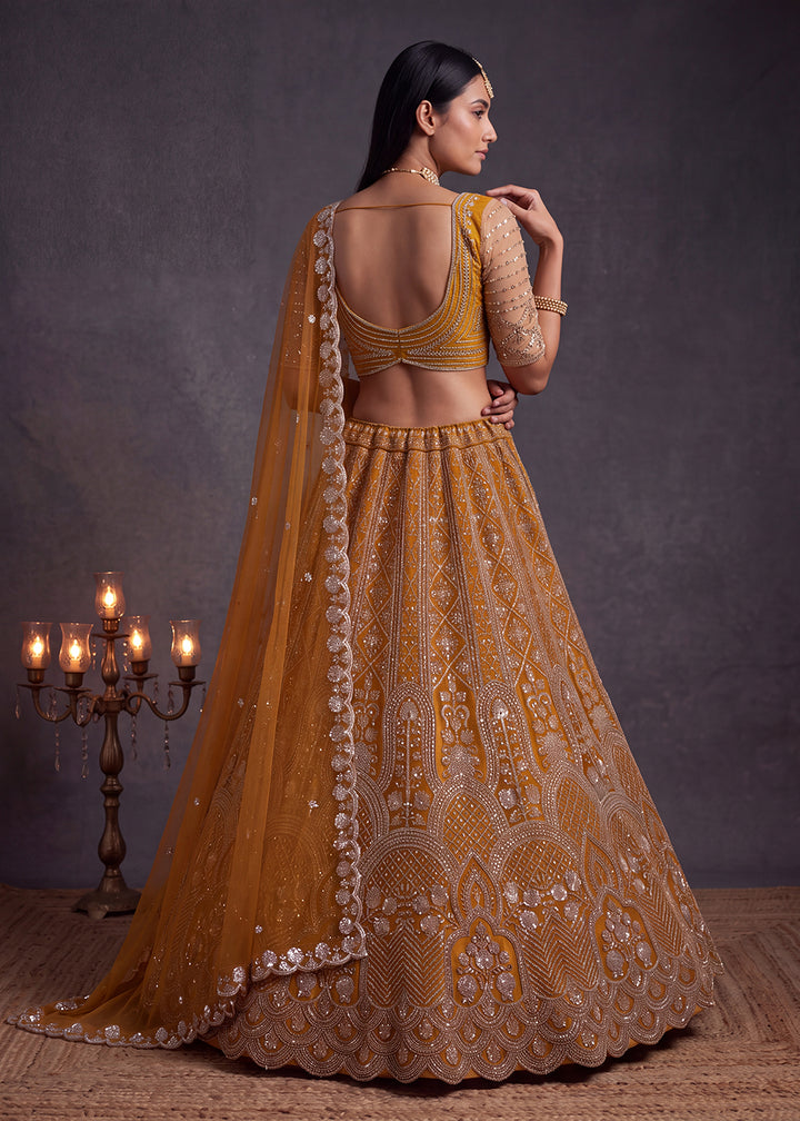 Shop Now Amazing Rust Designed Wedding Wear Lehenga Choli Online in USA, UK, Canada, France, Germany, Austria, Australia, Italy, Denmark &amp; Worldwide at Empress.