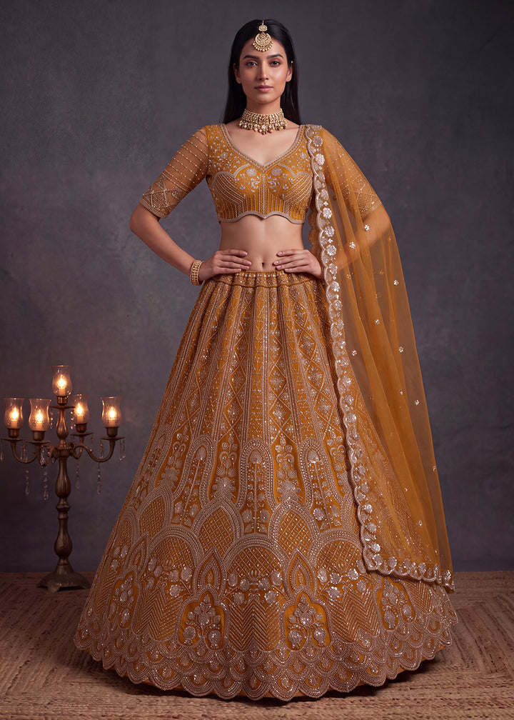 Shop Now Amazing Rust Designed Wedding Wear Lehenga Choli Online in USA, UK, Canada, France, Germany, Austria, Australia, Italy, Denmark &amp; Worldwide at Empress.