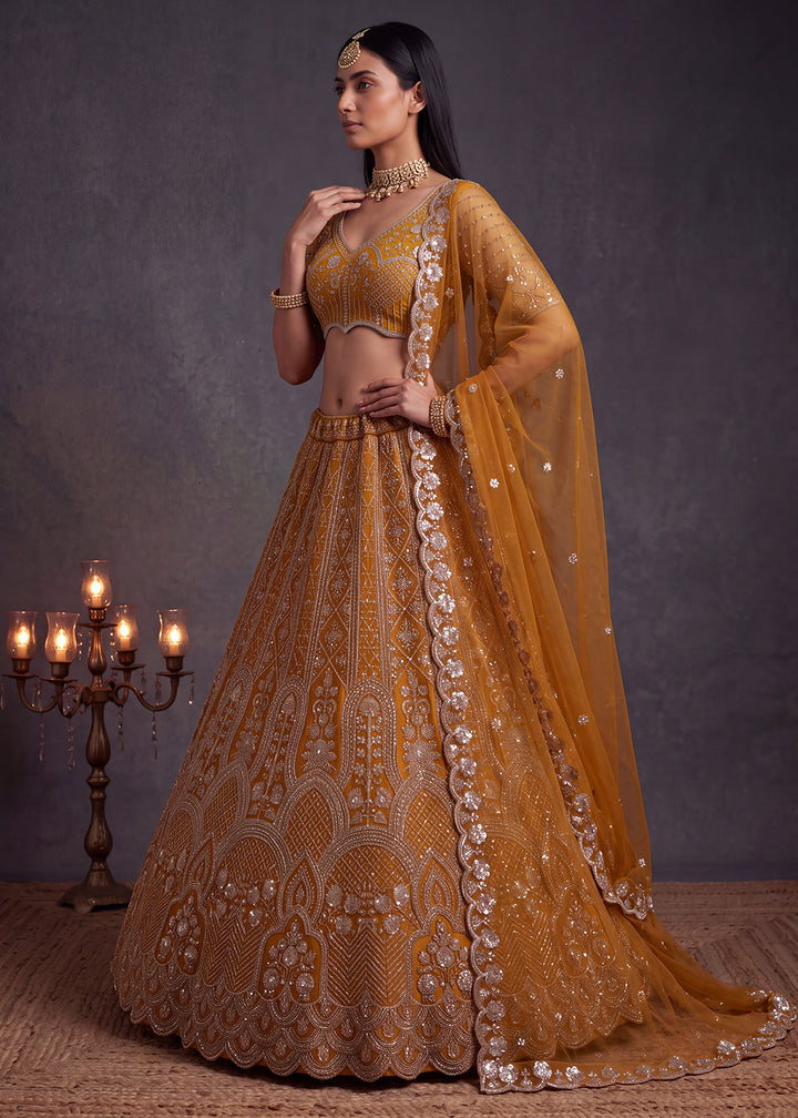 Shop Now Amazing Rust Designed Wedding Wear Lehenga Choli Online in USA, UK, Canada, France, Germany, Austria, Australia, Italy, Denmark &amp; Worldwide at Empress.